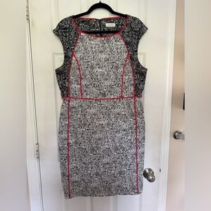 Elegant Black and White Dress with Red Accents